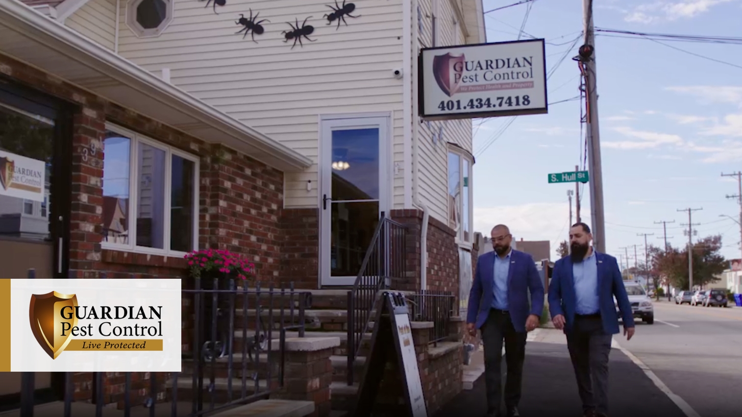 Two businessmen walking outside