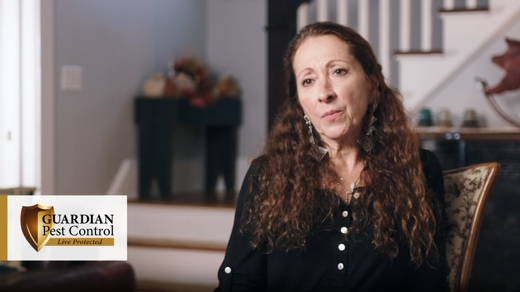 Female sitting in a chair facing forward